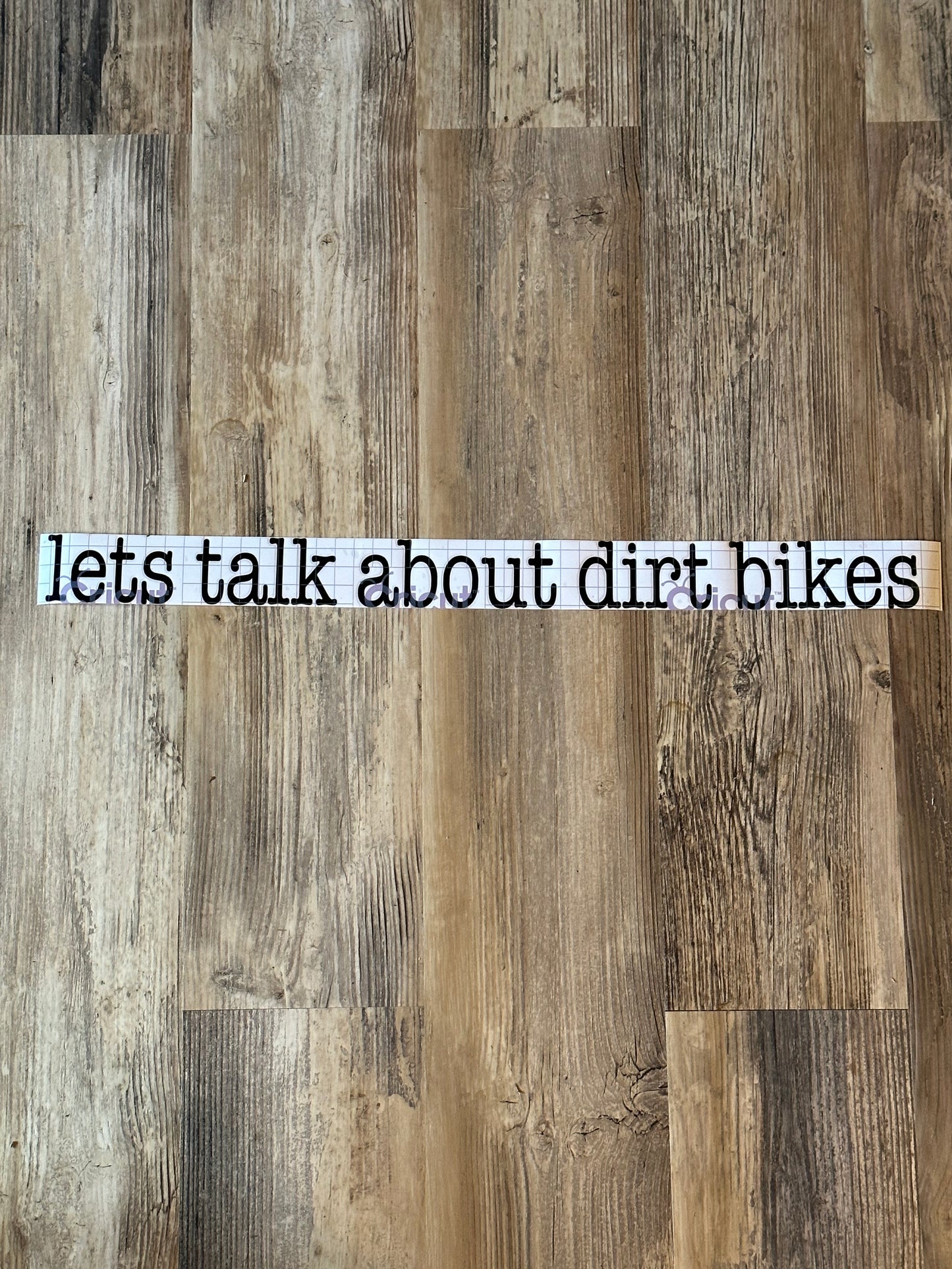 Vinyl Black “let’s talk about dirt bikes” decal.